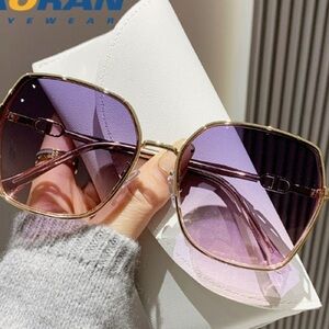 Elegant Purple Sunglasses with Gold Accents